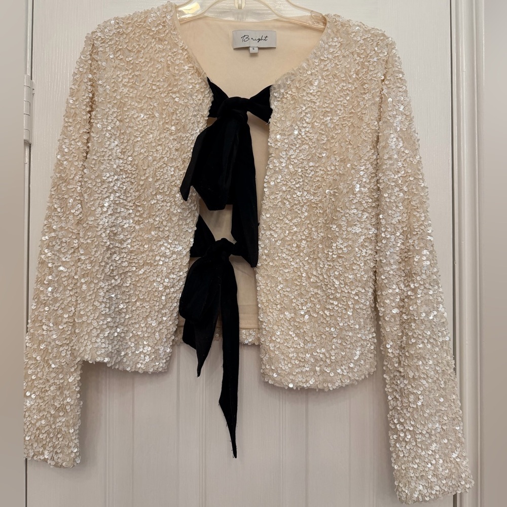 Bright- Boutique- Elegant Cream Sequin Jacket with Black Bow Tie Accents -Size S